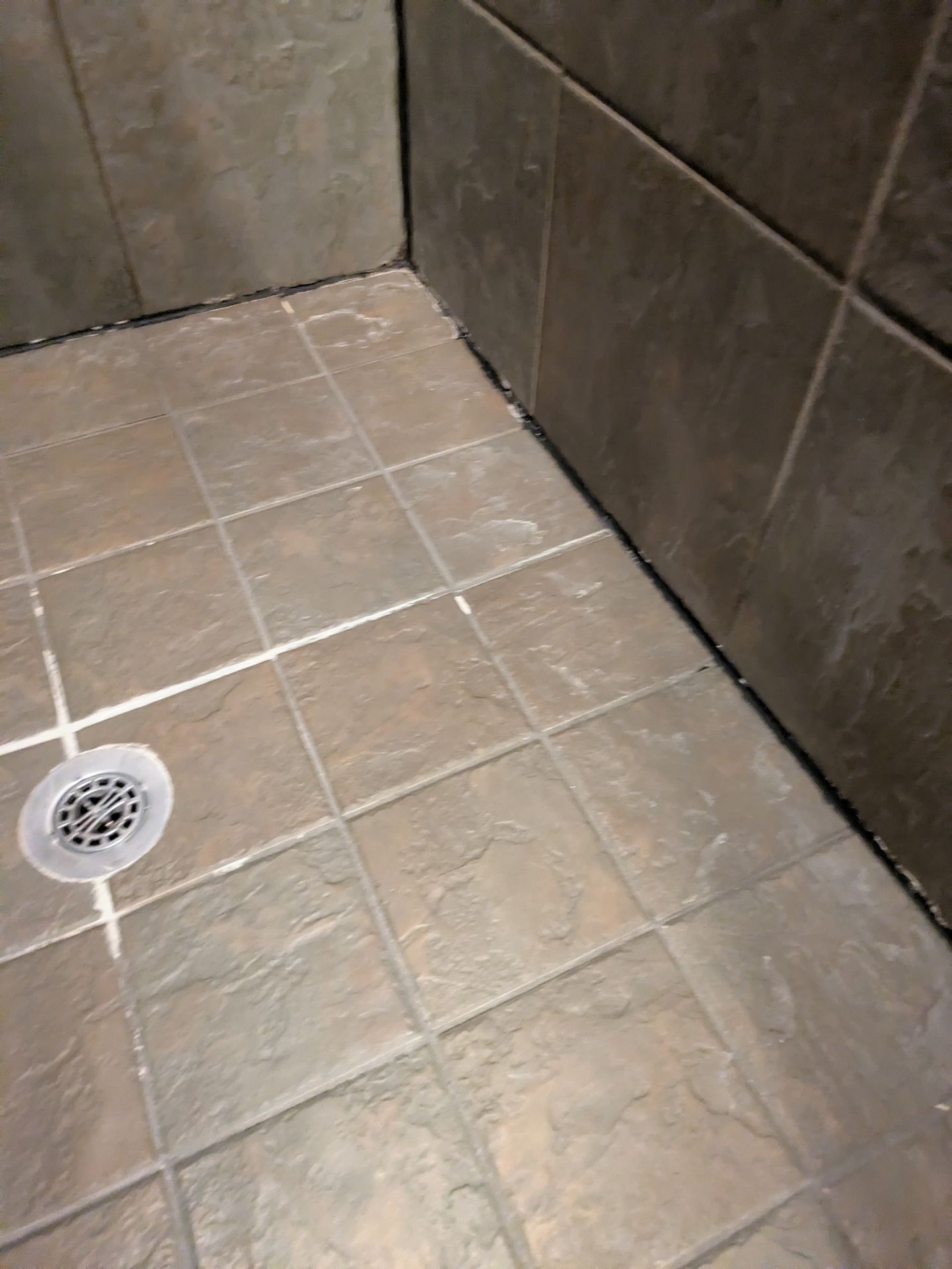 Precision tile cutting around a circular shower drain in Athens GA